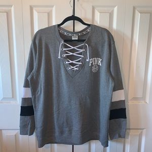 PINK sweater with lace up detailing